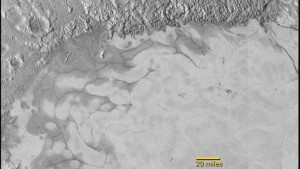 Mgła i płynące rzeki azotowego lodu na Plutonie.jpg